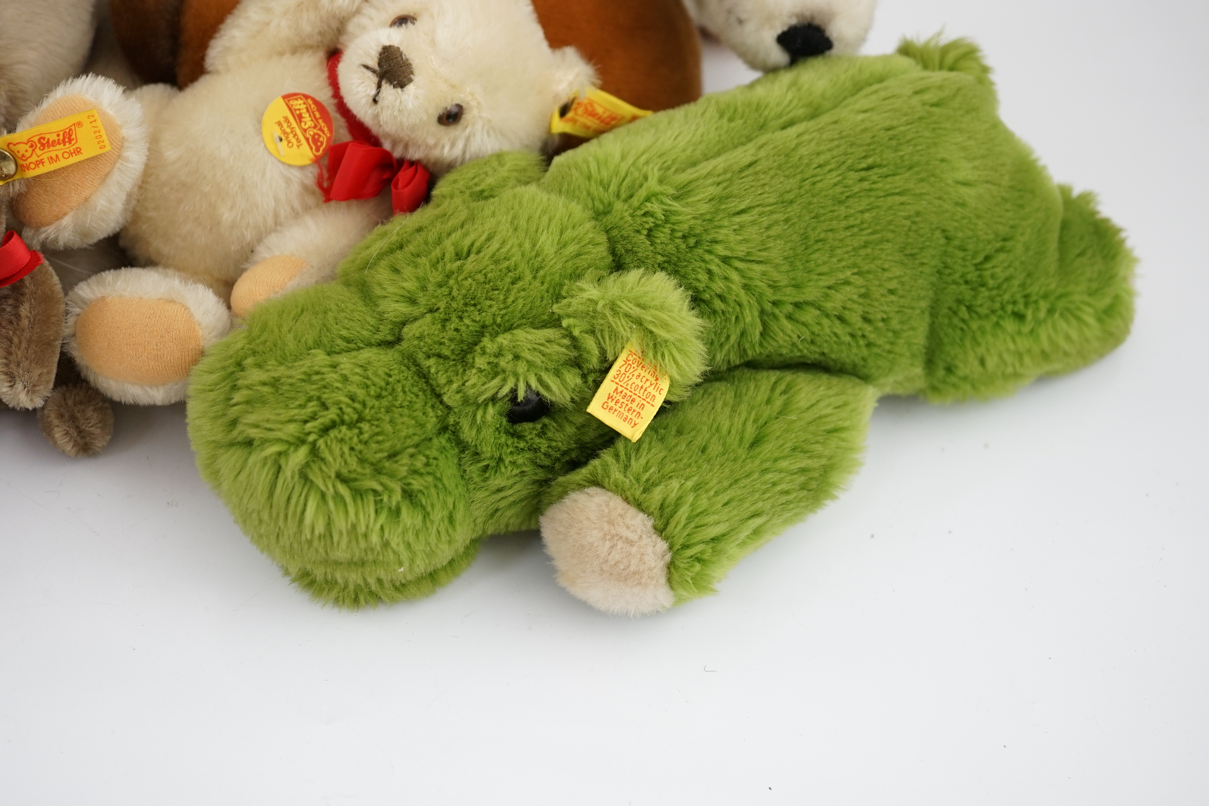 Ten assorted Steiff yellow tag animals, two yellow tag bears, together with Steiff catalogues